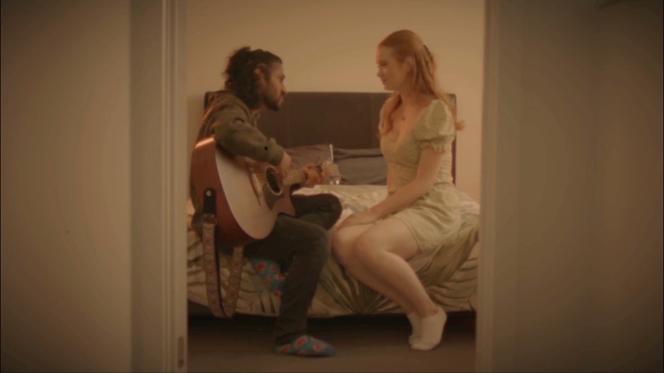 Still from the 'out of my mind' music video
